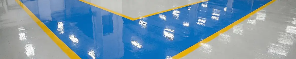A factory floor professionally covered and marked with epoxy flooring in Stockton, CA