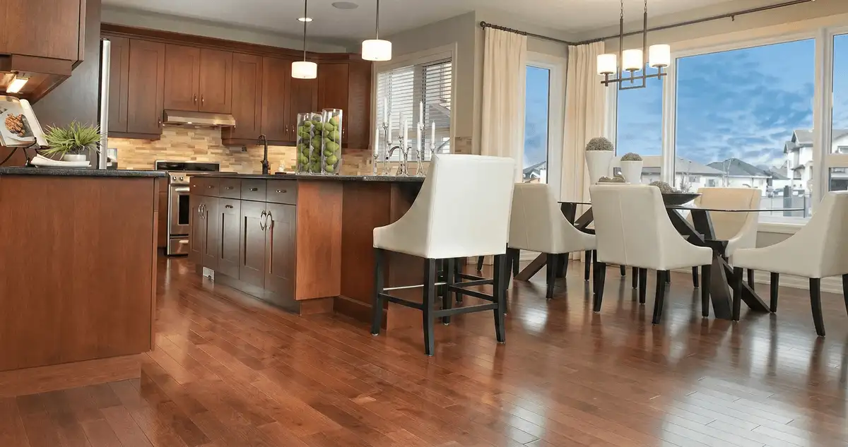 A modern kitchen with professionally installed wood flooring in Stockton, CA