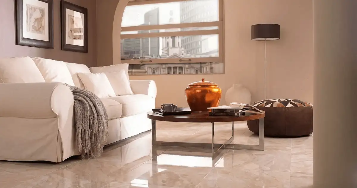 Modern living room with professionally installed marble flooring, a beige sofa, coffee table in Stockton, CA