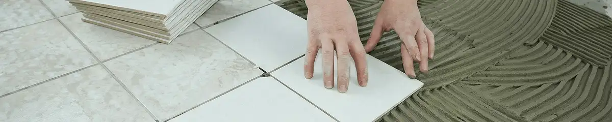 Professional installing white tile floors in Stockton, CA